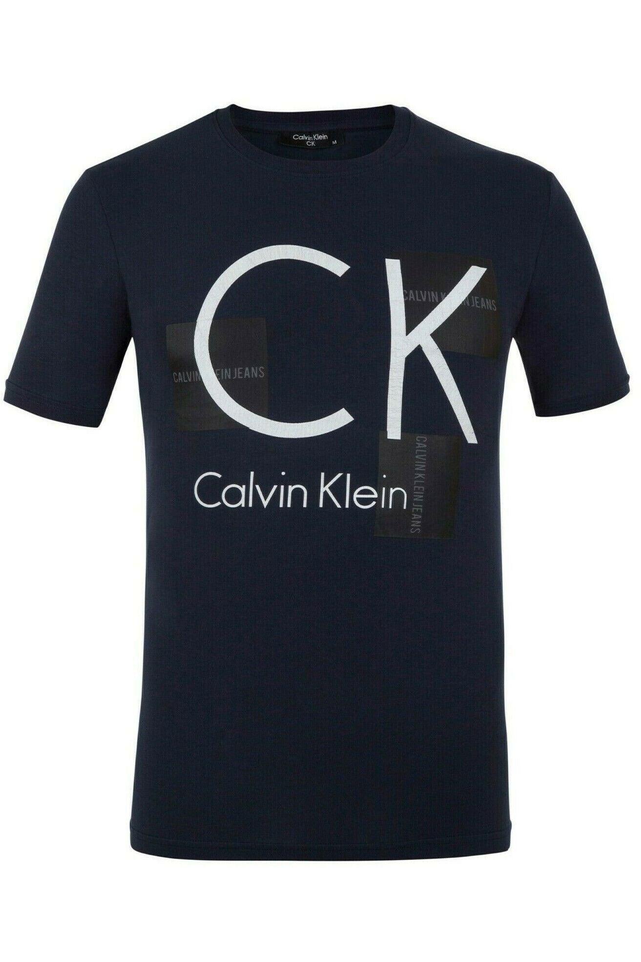Navy blue Calvin Klein t-shirt with large white CK logo and Calvin Klein Jeans text