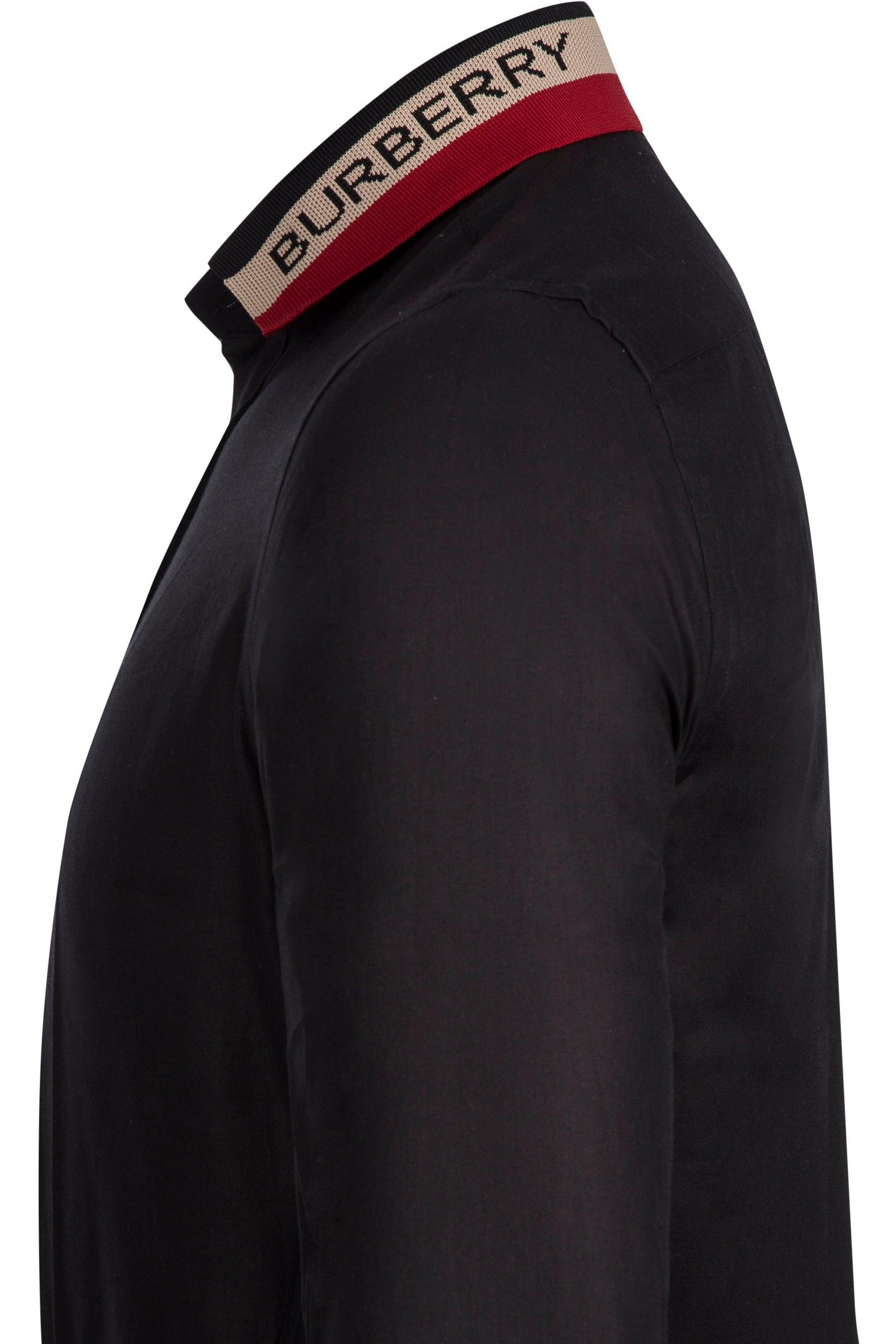 Black Burberry shirt with beige and red collar featuring Burberry logo